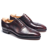 Victor Noir: Elegant Oxford Burgundy Leather Formal Shoes – Wingtip Detailing