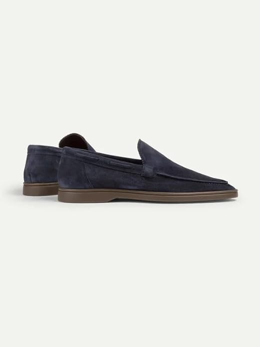 Elegant Dark blue suede Yatch loafer with a minimalist design and a comfortable white sole.