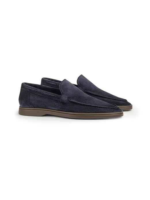 Elegant Dark blue suede Yatch loafer with a minimalist design and a comfortable white sole.