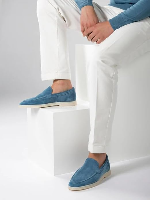 Elegant light blue suede Madewell loafer with a minimalist design and a comfortable white sole.