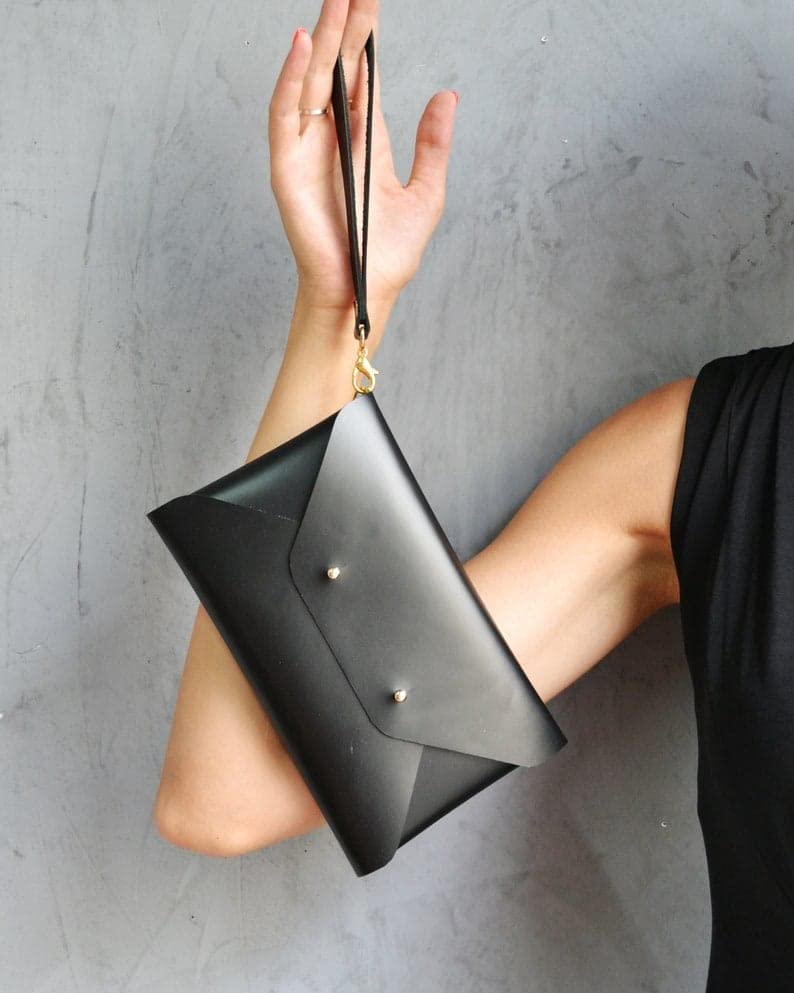 Clutch bag with wrist strap - Leather